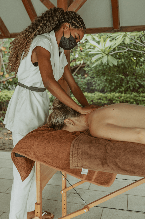 young married woman getting a massage in mauritius